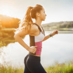 young woman run in nature