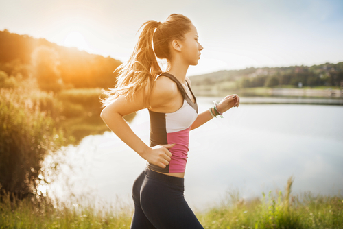 young woman run in nature