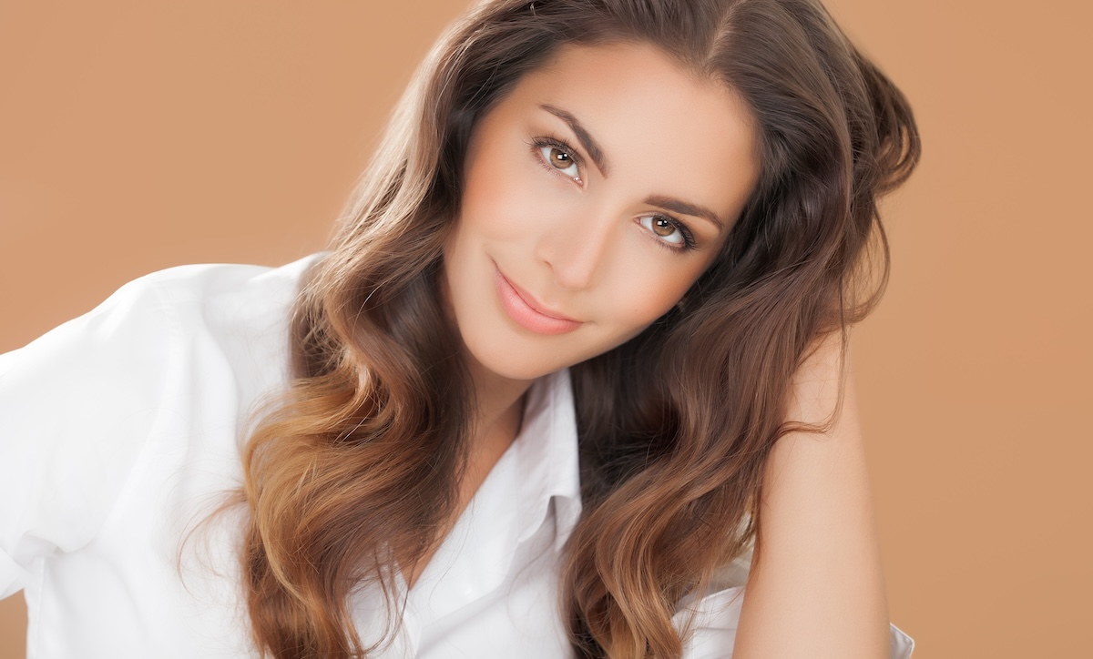 beautiful elegant young woman with luscious hair
