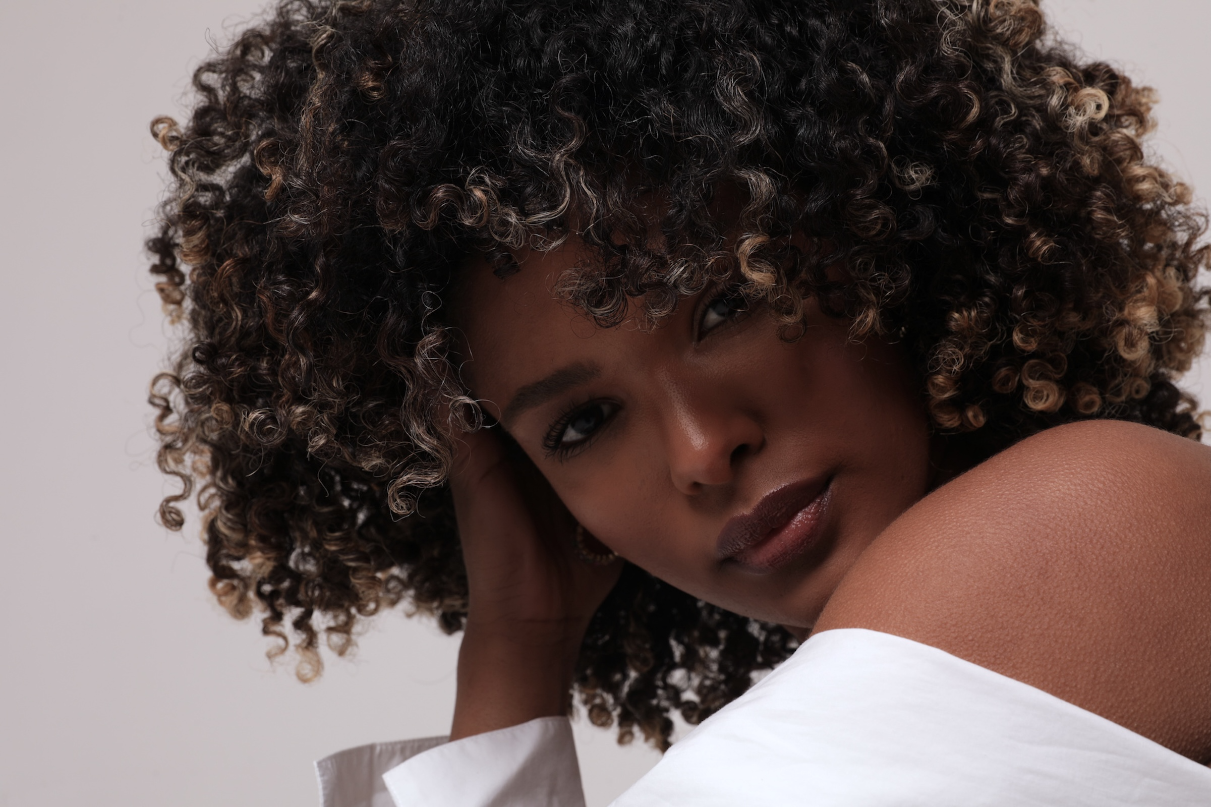 beautiful young woman with curly hair