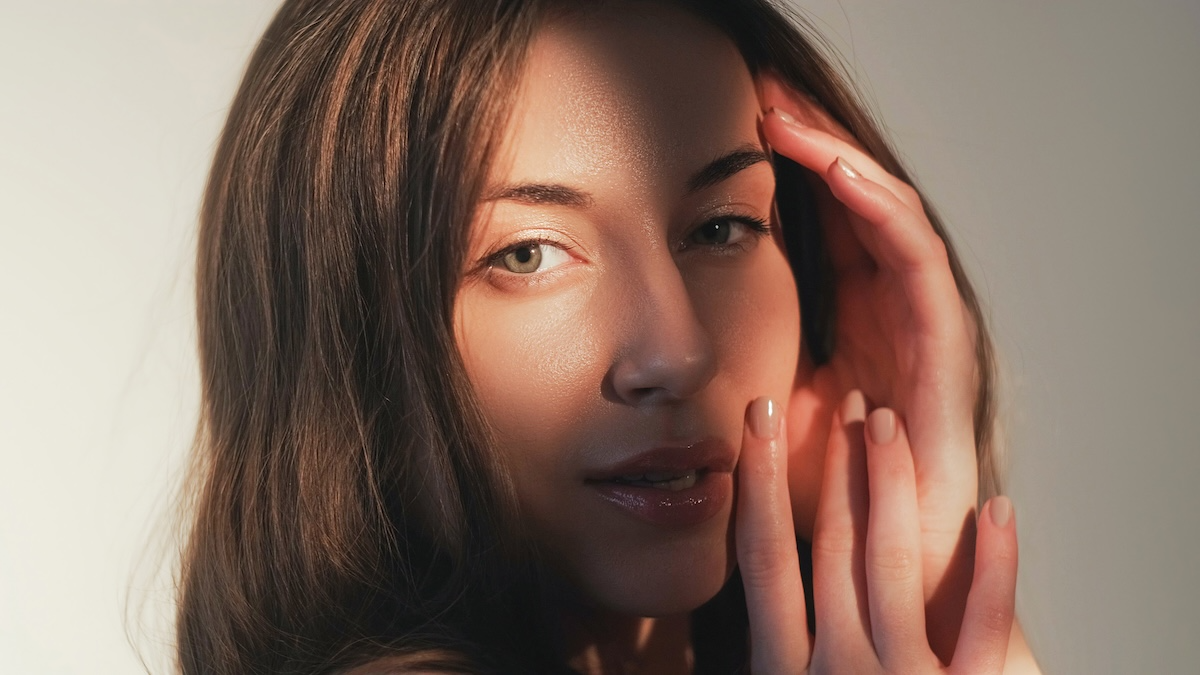 young woman with shadows on her face